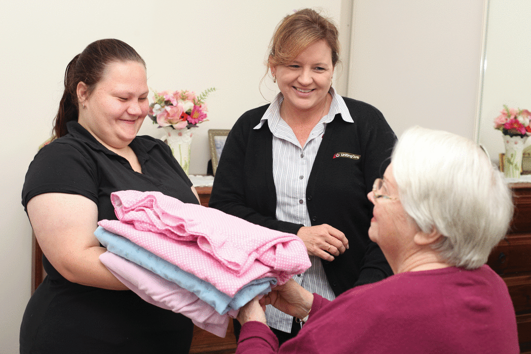 A Uniting Care worker supporting a client